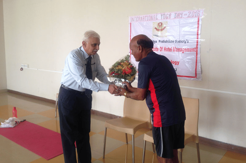 Dr. D.Y. Patil School of Hospitality and Tourism Tathawade Yoga Day photo 3